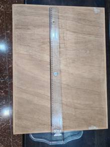 Drawing board with T-rule.