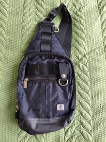 Zinc Blue Crossbody Sling Backpack.
