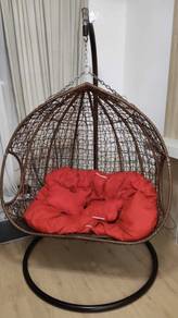 2 persons hanging chair