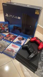 PS4 Pro 1TB w/ 2 Controllers and 6 Games