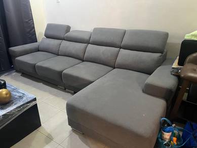 Grey sectional sofa with adjustable headrests