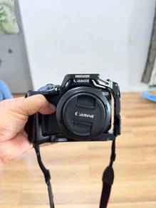 Canon r50+kitlens+newer cage+ 5 batteries