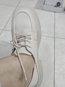 beige colour leather shoes