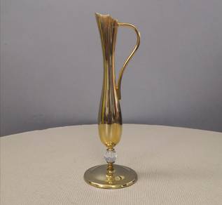 Gold plated vase with crystal ball