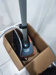 Garment ironing machine vertical hand held steam