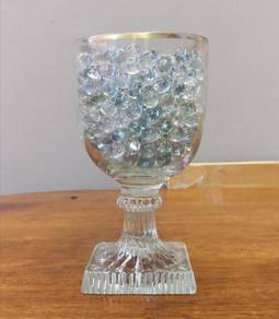 Vintage crystal footed glass with glass marbles