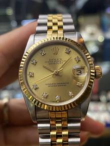 Rolex Datejust 68273 Diamond Gold Dial Size: 31mm