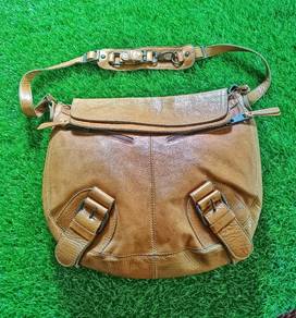 Vintage handmade leather sling bag vtg