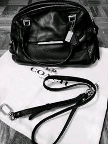 Women coach leather beg
