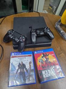 PS4 Slim Console with 2 Controllers and Games