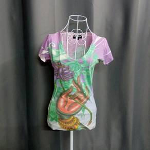 Christian Audigier Top