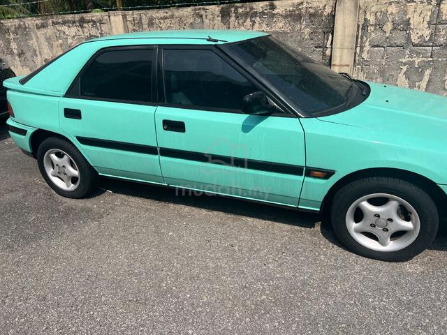 1995 Mazda 323 1.6 ASTINA BTB1 (M) - 2