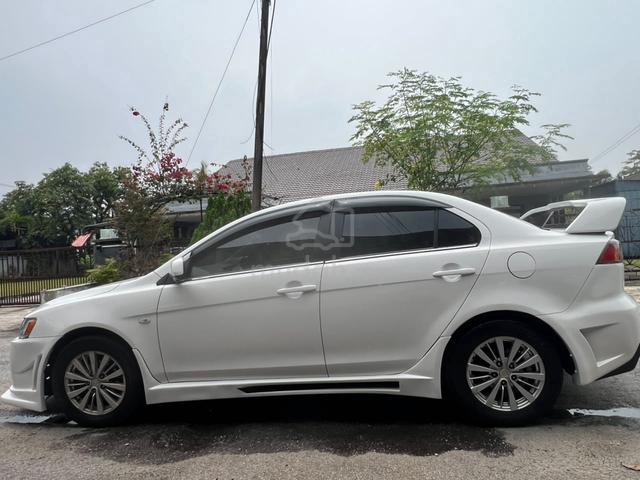 2011 Proton INSPIRA 2.0 C/VERT LANCER ANDROID PLAY - 4