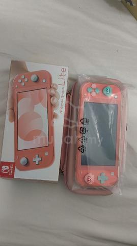 Nintendo switch lite coral pink - photo 4 of 6