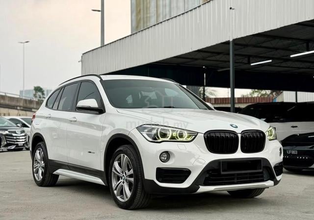 2017 BMW X1 2.0L sDrive20i Sunroof 18IN Leather - 1