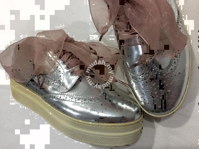 Authentic Prada Metallic brogues silver flat shoes - Shoes for sale in  Johor Bahru, Johor