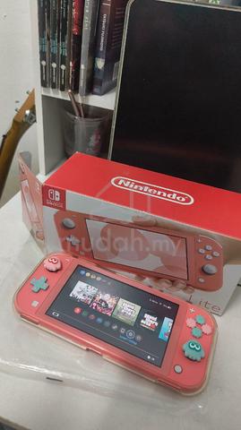 Nintendo switch lite coral pink - photo 3 of 6