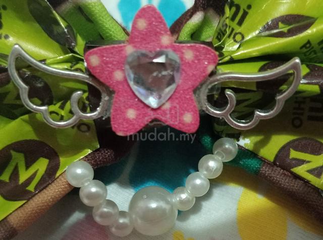 Handmade bow hairclips made by recycled materials  - photo 5 of 6