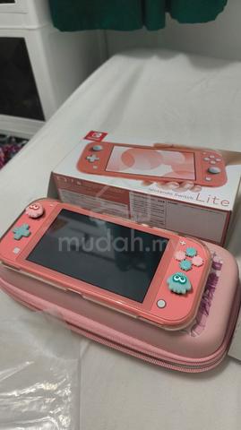 Nintendo switch lite coral pink - photo 2 of 6