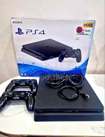 PS4 Slim 1TB + FREE 6 Games! - photo 2 of 3