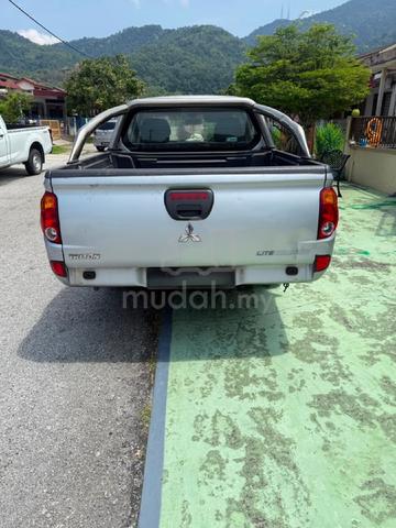 triton 2.5 lite 5 speed manual 4 door - 2