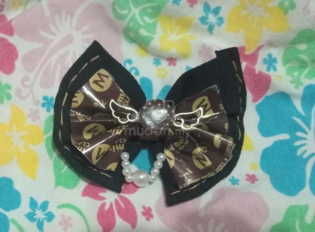 Handmade bow hairclips made by recycled materials  - photo 6 of 6