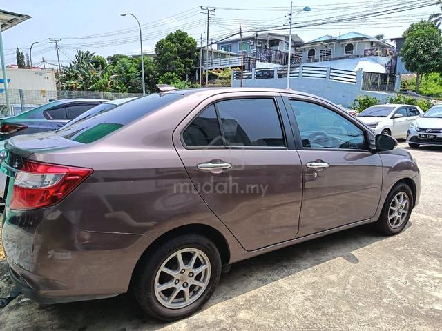 produa bezza 1.3 auto tahun 2017 - 4