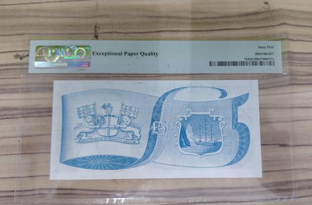 This is a £5 banknote issued by the Government - photo 2 of 2