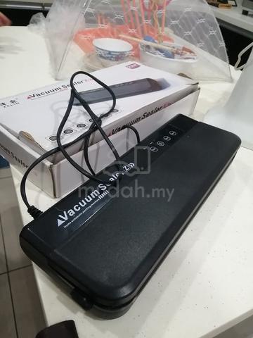 used vacuum sealer  - photo 2 of 4
