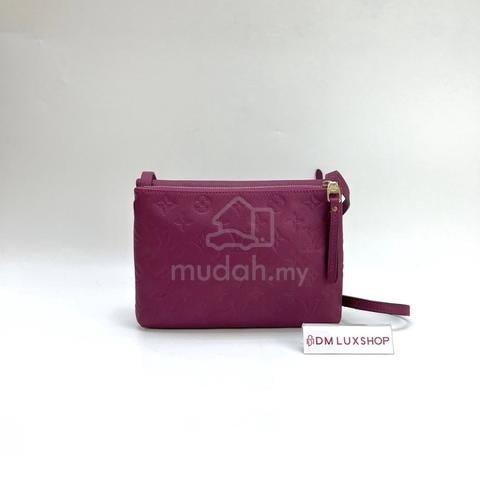 Preloved LV Fuschia Empreinte Twice Crossbody Bag - photo 2 of 6