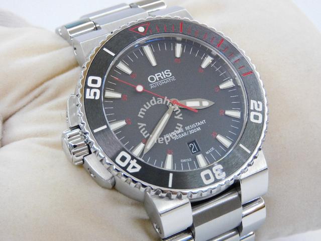 Limited Edition Oris Aquis Red. left hand drive Watches