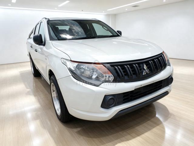 2019 🛑Mitsubishi Triton Quest 2.5 Mt 4X2 1 OWNER - 1