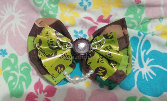 Handmade bow hairclips made by recycled materials  - photo 2 of 6