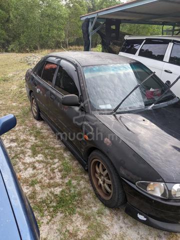 2003 Proton WIRA 1.5 A/B GLi (M) & kancil 660 - 1