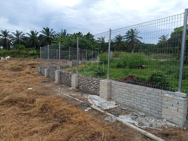 1.5 Acre Flat Commercial/Agricultural Land for Rent with boundary wall 1