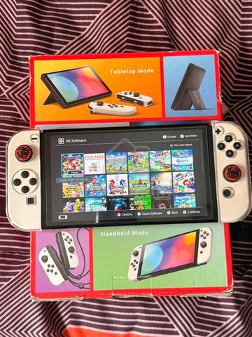Nitendo switch oled 256gb triple mod jailbreak - photo 3 of 4