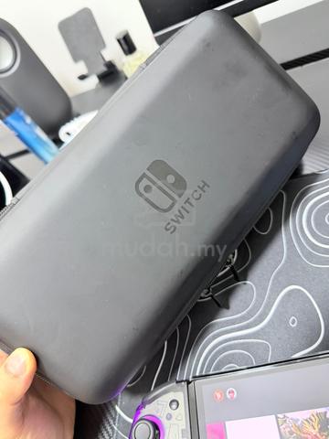Nintendo switch oled 64gb + 128gb - photo 3 of 3