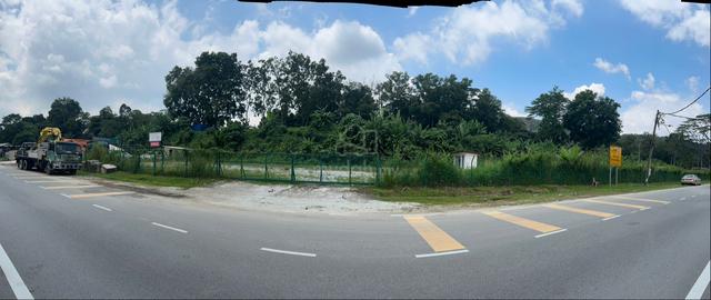 flat land with chain fencing and gate. 1