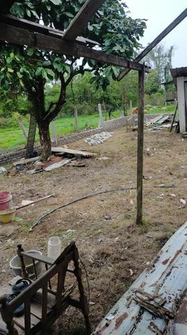 Rumah kayu bersama kebun untuk dijual 1