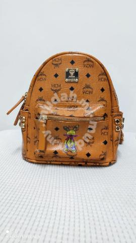 used leather backpack