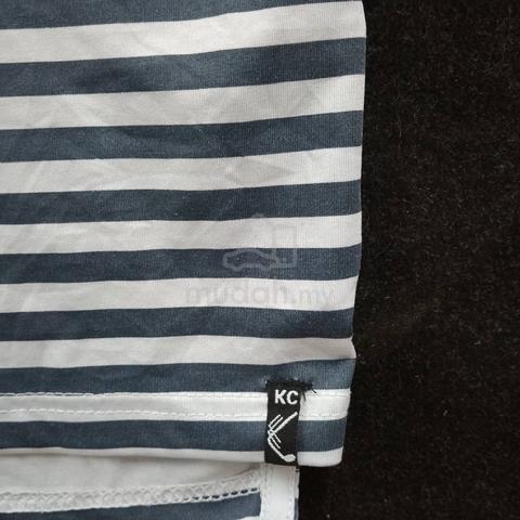 baju golf - photo 3 of 6