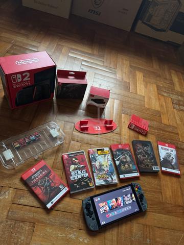 Nintendo Switch 2 with games - photo 2 of 5