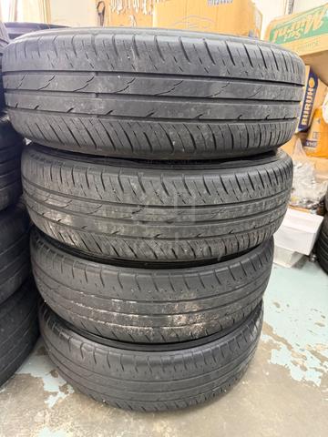 Rim original axia 14 inch siap tayar toyo tahun 24 - photo 6 of 6