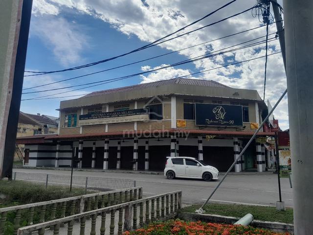 corner lot shop main roadside view 1