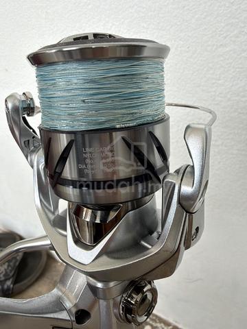 shimano stradic 4000xg & xzgoa rod - photo 2 of 6